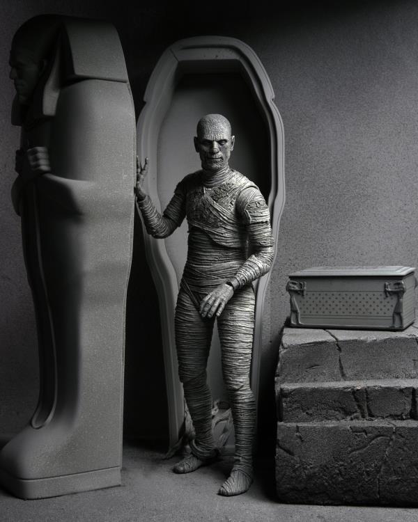 BBT - Universal Monsters Ultimate Mummy (Black & White) Figure stepping out of an open coffin